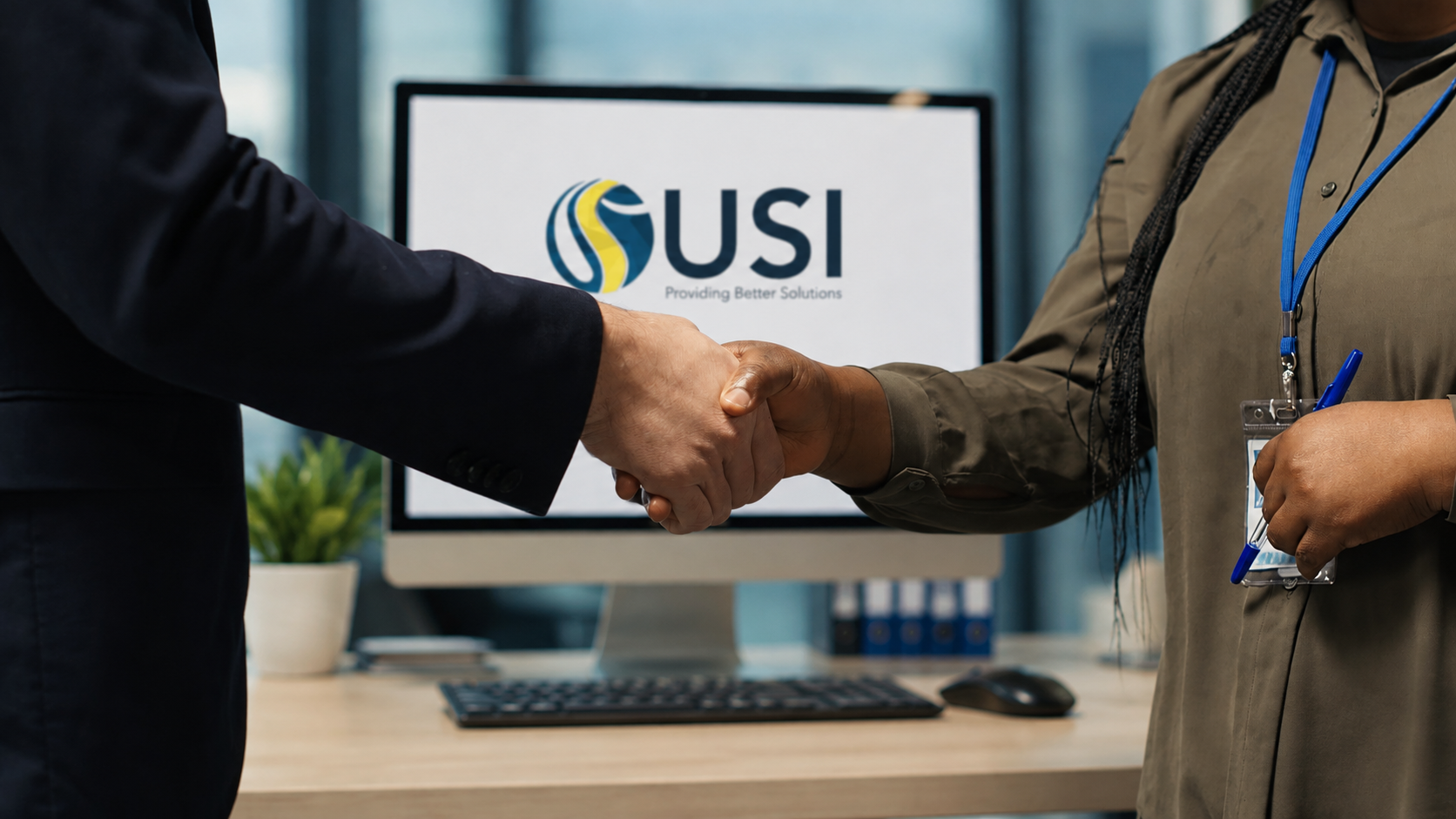 USI representatives shaking hands with utility industry partners